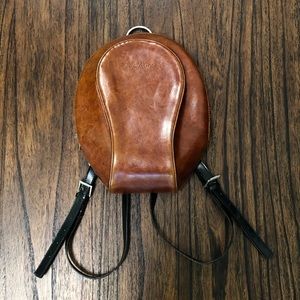 La Philip Cognac colored backpack style handbag